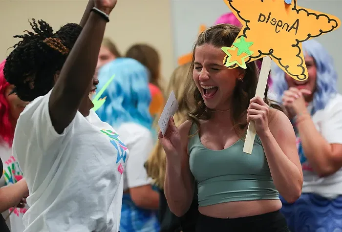 students celebrate at bid day